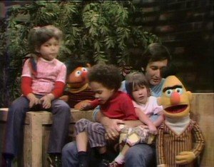 Bob, Ernie, Bert, and kids play a game.