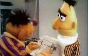 Ernie shows Bert his treasure map.