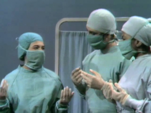 The doctors confer.