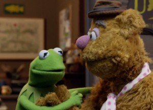 Kermit helps his woozy friend, Fozzie.